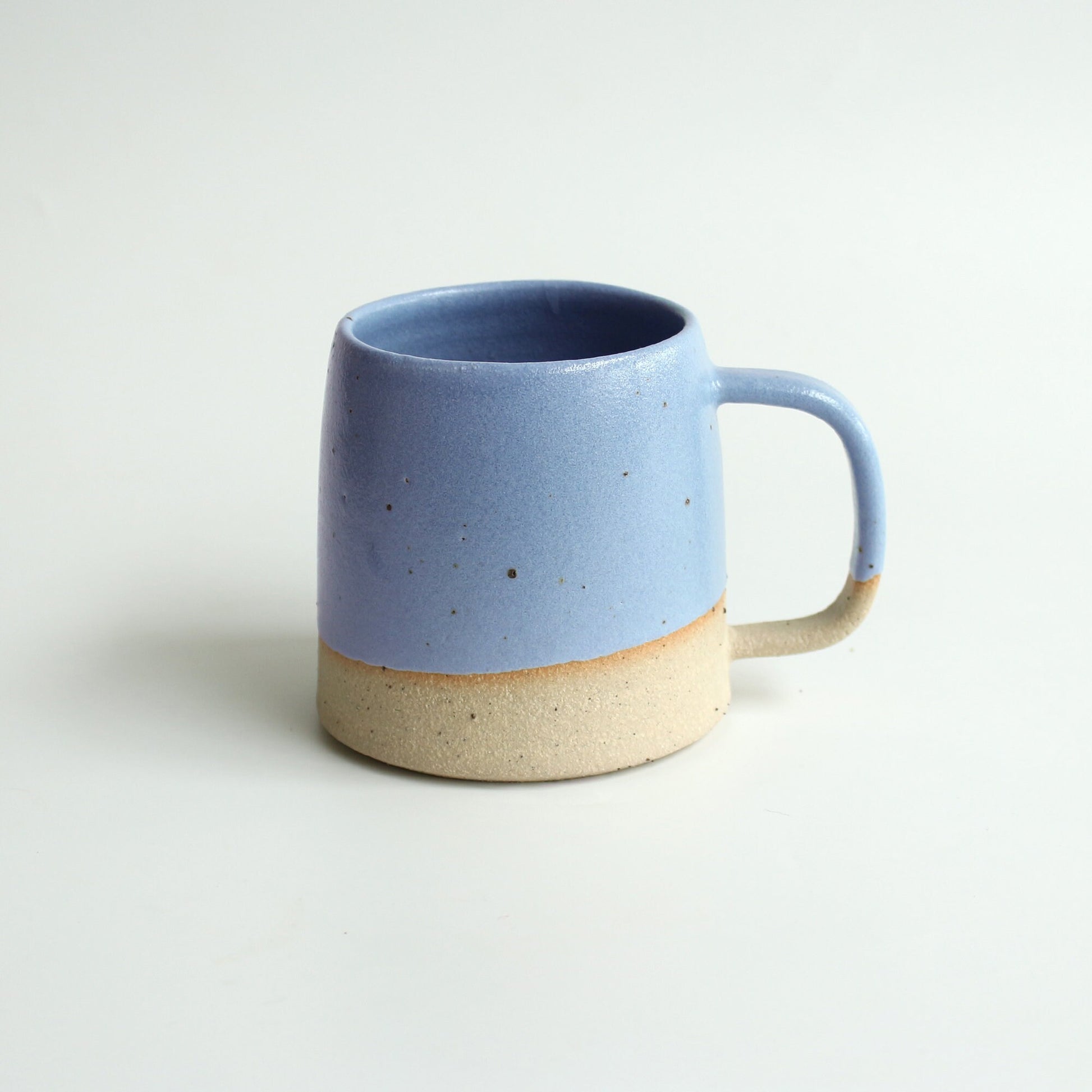 Ceramic Mug in White, Yellow, Pink, Blue and Green